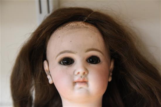 A Jumeau bisque head Bebe doll,